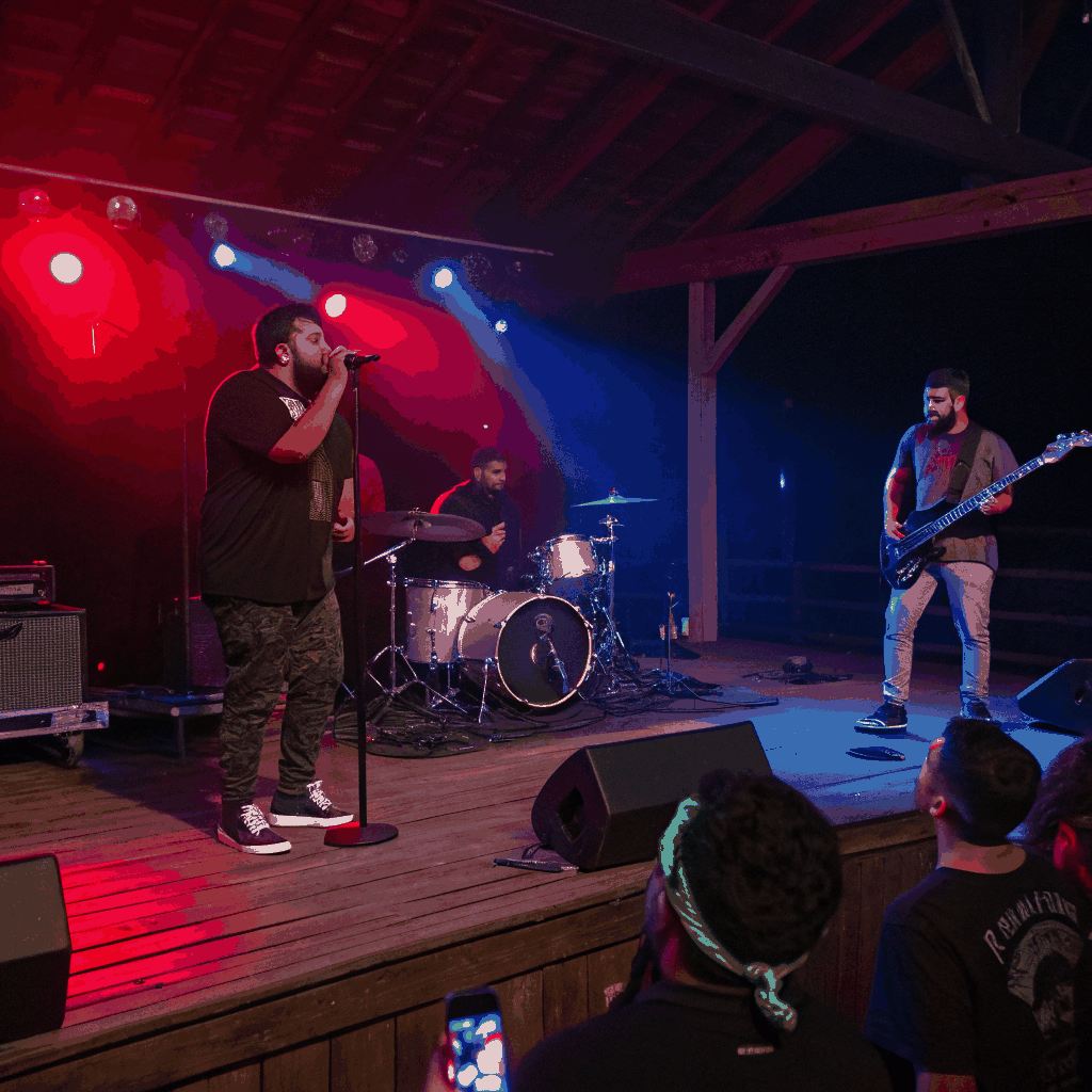 Live band performing on stage in front of audience